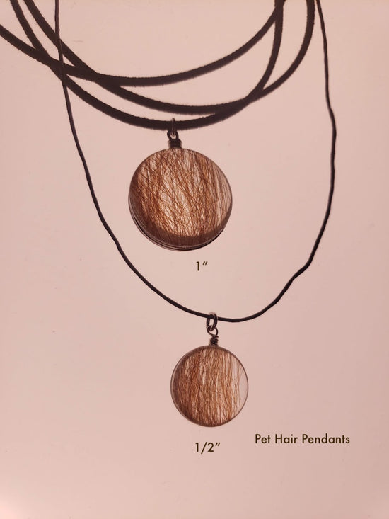 Glass pendants filled with pet hair