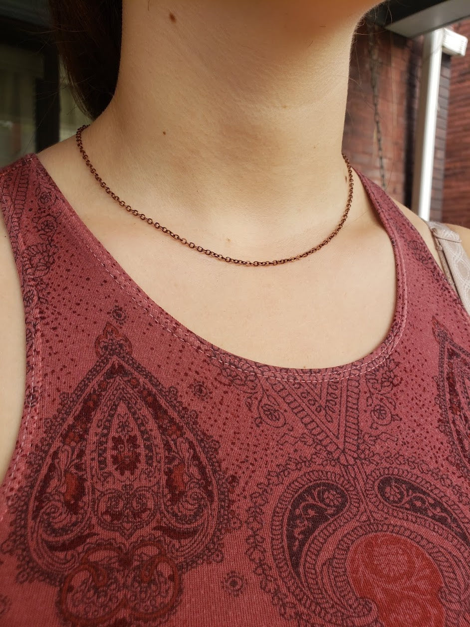 Close up of white girl wearing a 17" Copper Chain
