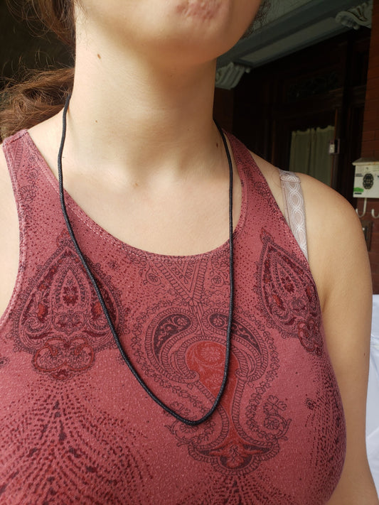 Close up of white girl wearing a 32" Waxed Cotton Cord