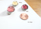 Rose Petal Pin's different colors - pink, yellow, red, and a penny for scale