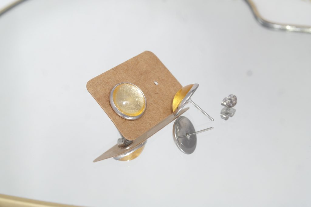 The front and back of the Sungold Stud Earrings to show the stud
